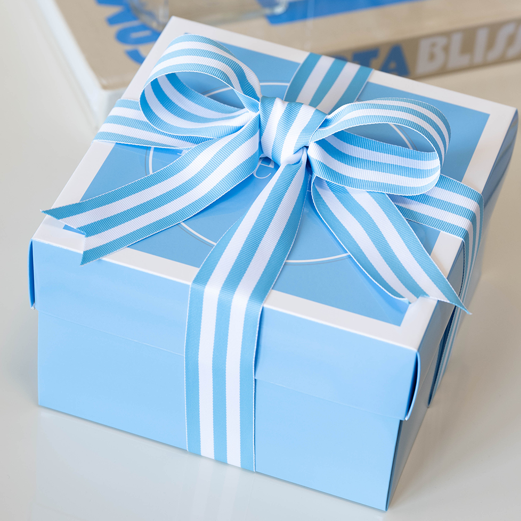 Light blue gift box with white lid, wrapped with a blue and white striped ribbon tied in a bow.