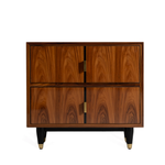 Mid-century style wooden side table with rich walnut finish, two drawers, black tapered legs with brass tips.