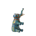Colorful elephant figurine with intricate patterns on a white background