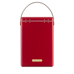 back of A red metal Fieldbar wine cooler with a brown faux-leather handle on a white background.
