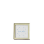 A square picture frame with a light sage green glazed rim, featuring a blue circular outline and the text 'blue print' on the front, set against a plain white background.