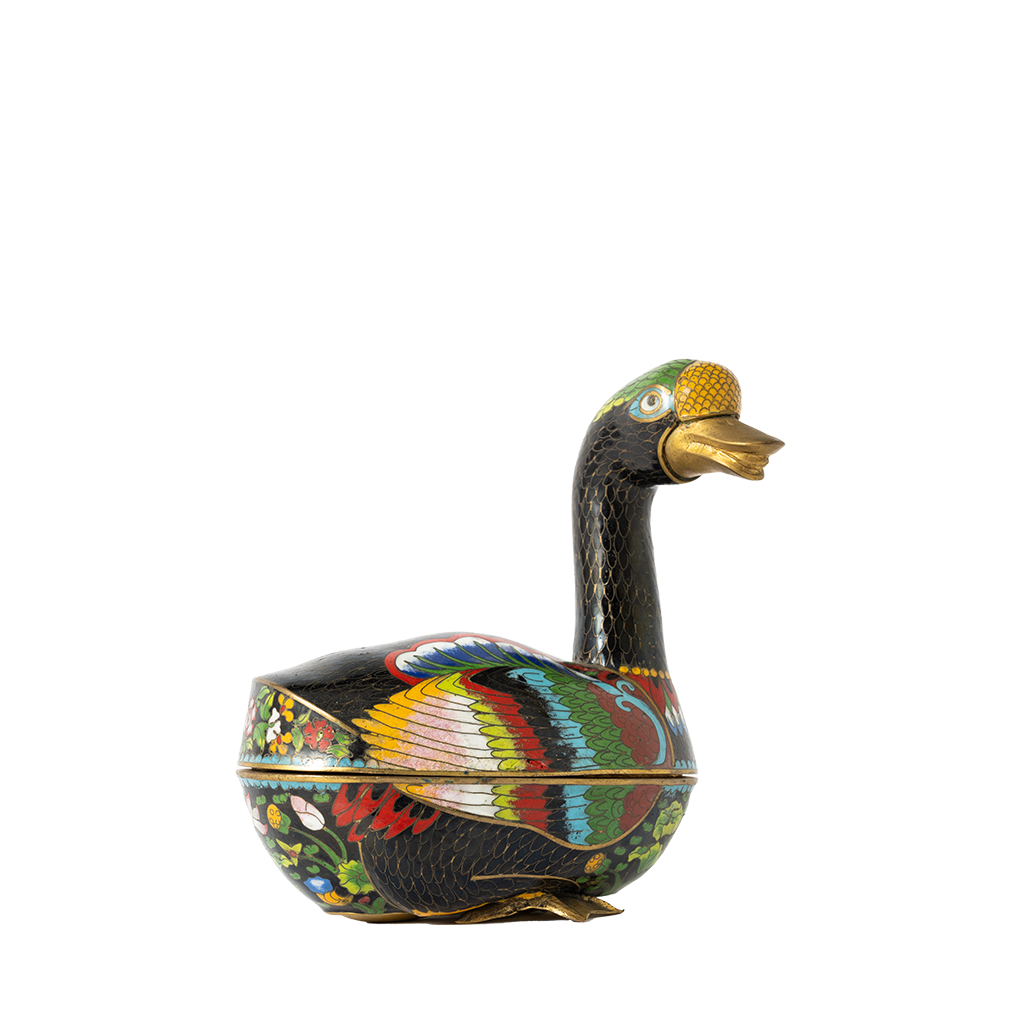Colorful swan-shaped trinket box on a white background