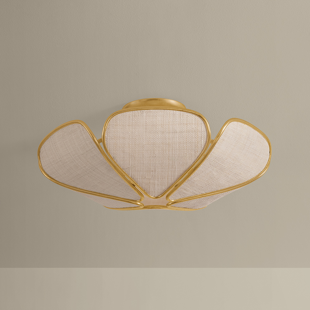 A modern semi-flush mount ceiling light fixture with a gold-finished metal frame and three textured beige fabric shades, shown against a neutral beige background.