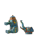 Decorative elephant figurines with intricate designs on a white background