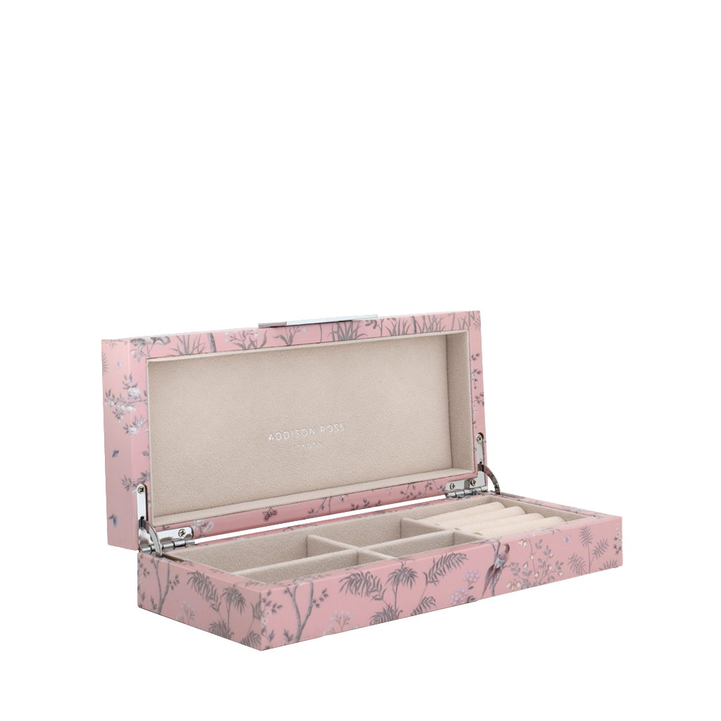 Pink jewelry box with floral design on a white background