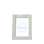 Mother of pearl picture frame with 'blue print' text on a white background