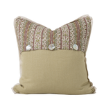 Decorative pillow with patterned top and solid beige bottom on a white background
