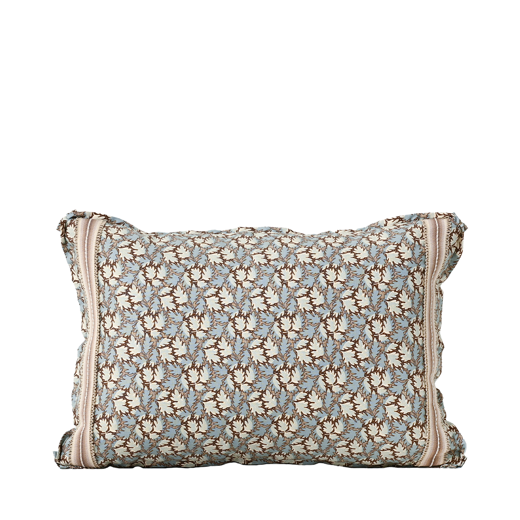 Floral patterned pillow with zipper on a white background