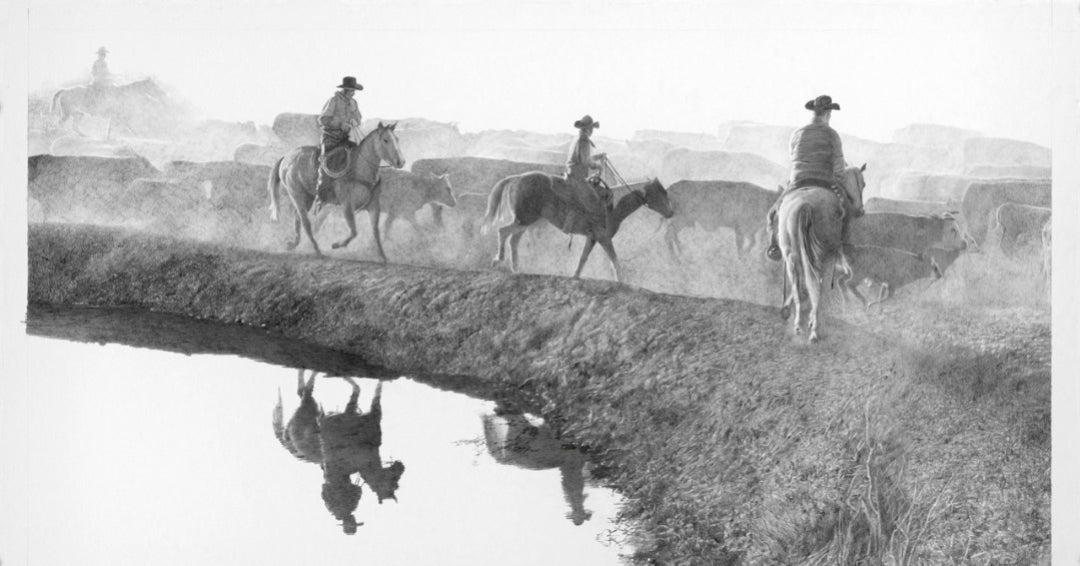 Three cowboys on horseback near a water hole with reflections in the water.