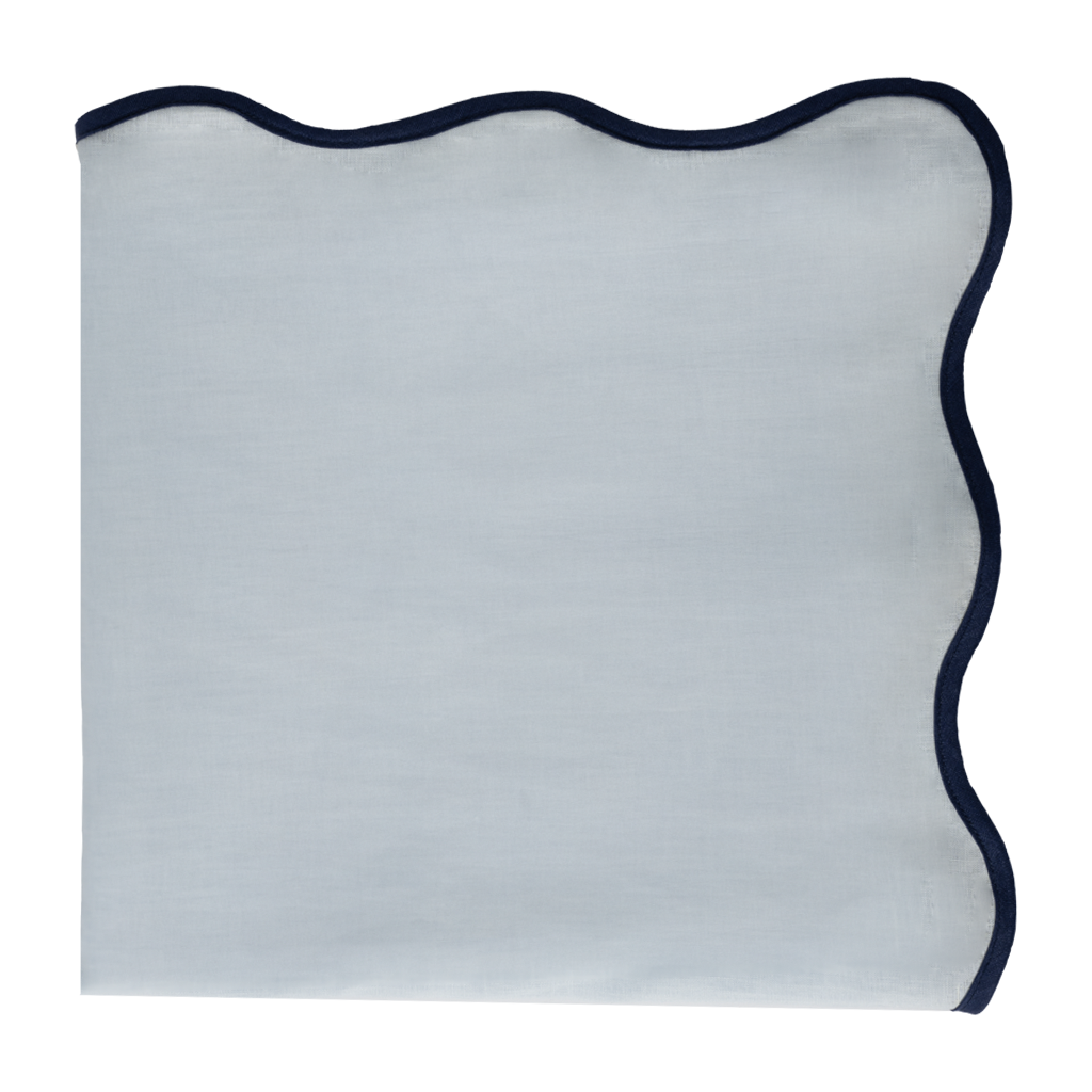 blue tablecloth with navy blue trim on a white background