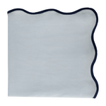 blue tablecloth with navy blue trim on a white background
