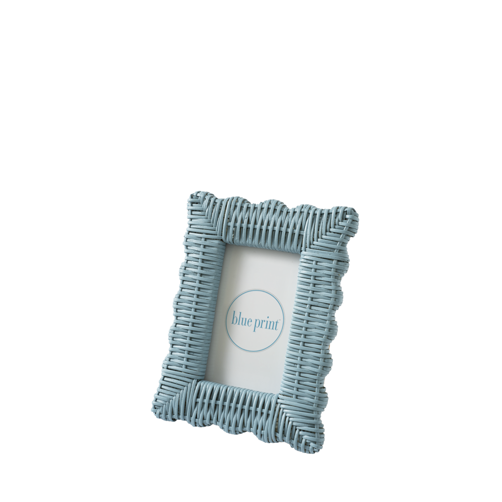 Blue wicker picture frame on a white background