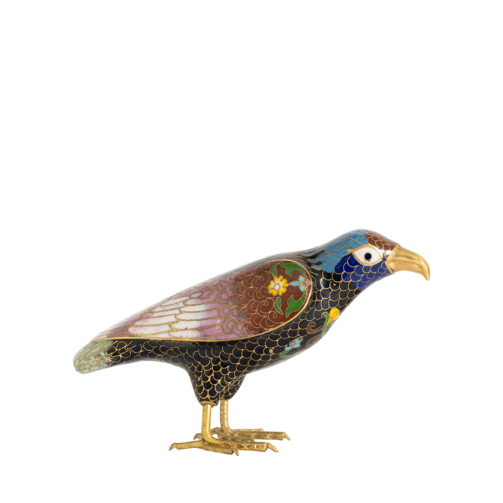 A cloisonne decorative bird with intricate details and stunning colors, crafted with a traditional technique.