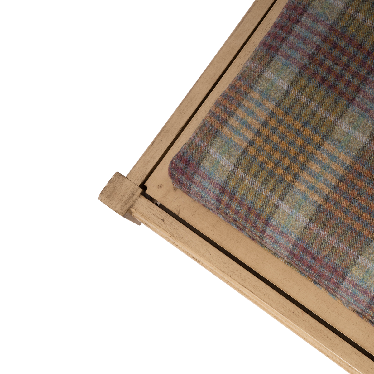 Close-up of the top. The reversible construction allows the piece to transition between an ottoman and cocktail table.
