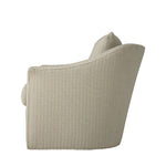 Side view of the upholstered armchair showing its softly rounded back and clean, tailored construction. The cream woven fabric continues across the entire chair.