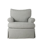 Plush upholstered armchair featuring a soft gray and cream small-scale geometric pattern. The chair has a generously cushioned back and seat, rounded arms, and a tailored skirted base.