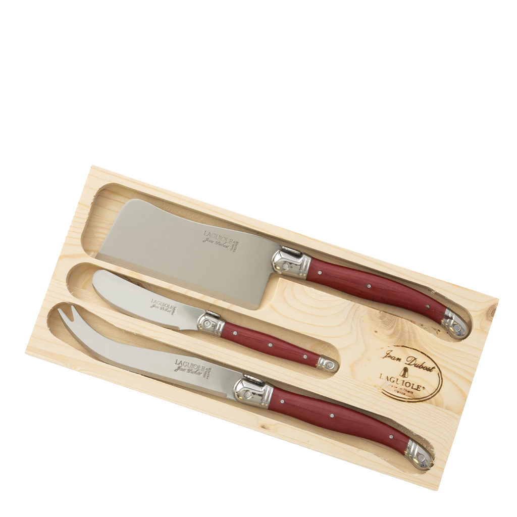 A three-piece cheese knife set featuring a cleaver, a steak knife, and a fork with reddish-brown wooden handles and silver metal bolsters, presented in a light natural wood gift box on a white background.