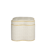 Patterned ottoman with a gold trim on a white background