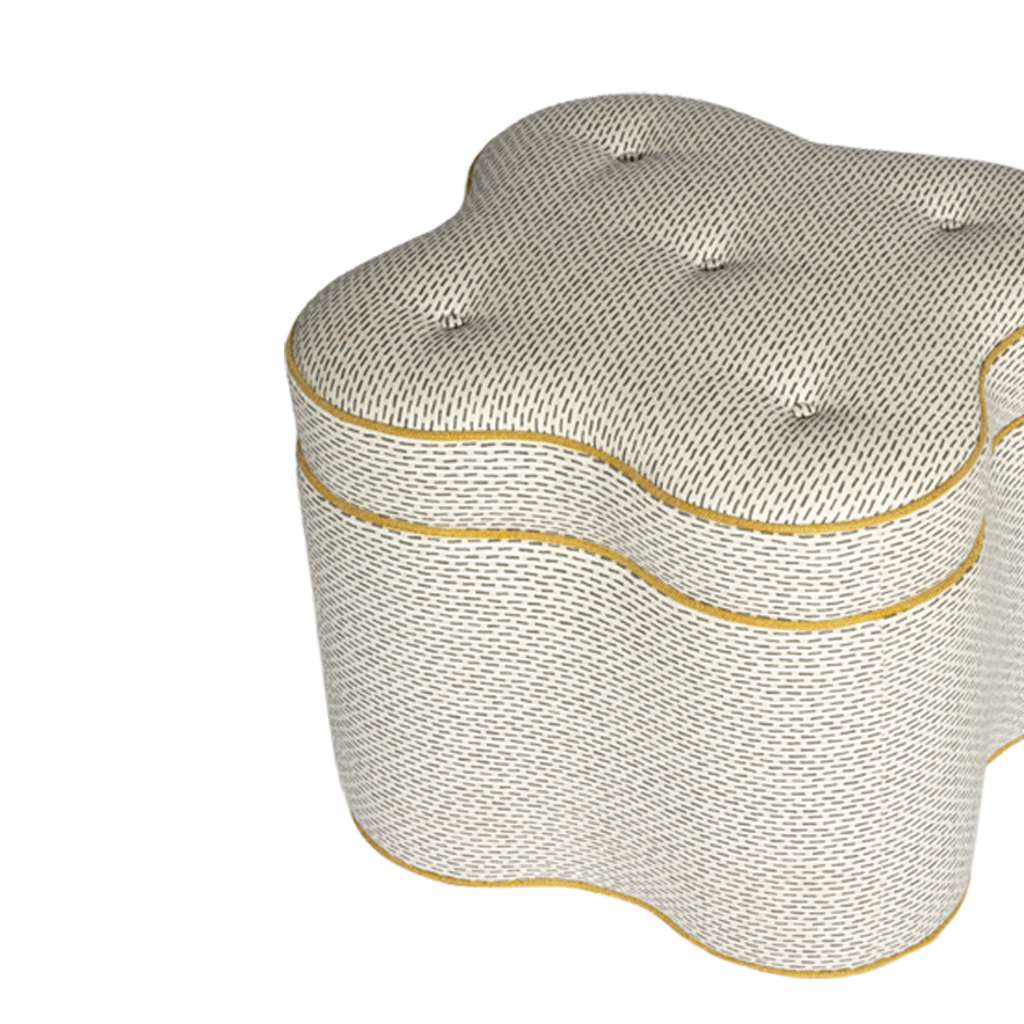 Patterned ottoman with a gold rim on a white background