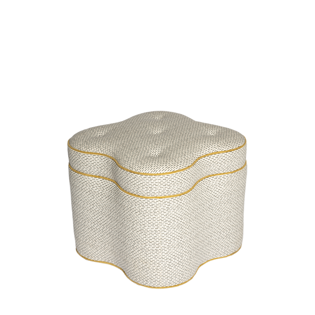 Patterned ottoman with yellow trim on white background