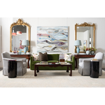 green couch, gold mirrors, grey chairs