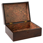 Wooden jewelry box with marbled interior on a white background