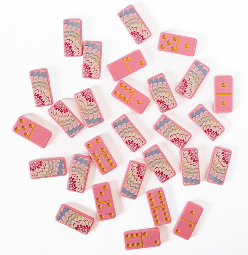 Set of pink and multicolored dominoes on a white background