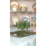 set of 4 green scalloped wine glasses on silver tray