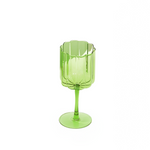 Green wine glass with wavy scalloped rim