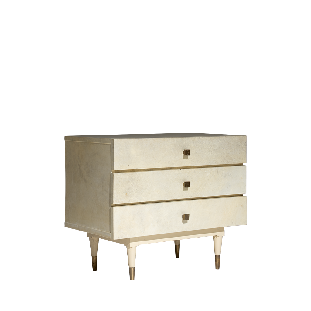 Beige dresser with three drawers on a white background