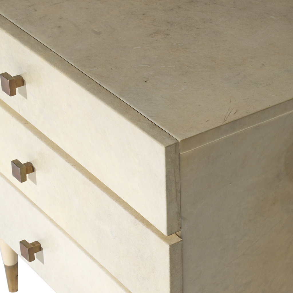 Close-up of a chest with brass handles
