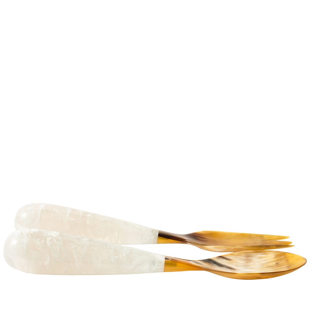 Set of two spoons with white handles and gold tips on a white background