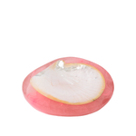 Heart-shaped object with pink outer rim and white inner surface on a white background