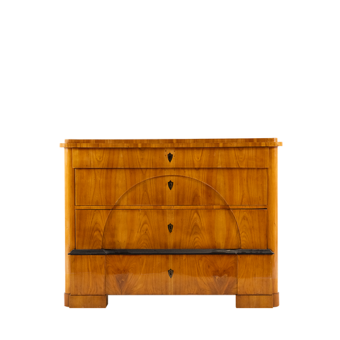 Lois Chest. A wooden chest with 4 drawers in total. It has one thin top drawer and 3 more below. It also has a black stripe right above the last bottom drawer