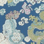 Blue tablecloth with whimsical gold dragon, lotus flowers, and cloud motifs in pastel shades.