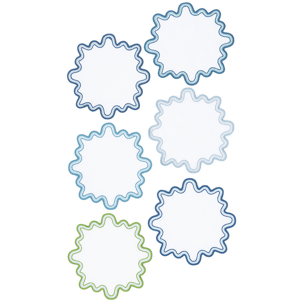 Set of six fabric coasters with scalloped wave edges in blue, navy, light blue, and green shades.