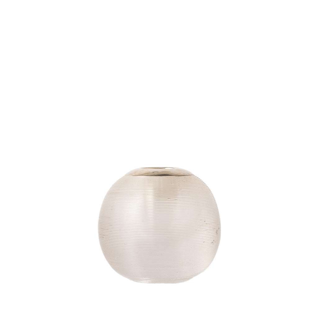 A small, round, ribbed glass vase in a frosted off-white or cream color, set against a solid white background.