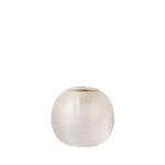 A small, round, ribbed glass vase in a frosted off-white or cream color, set against a solid white background.