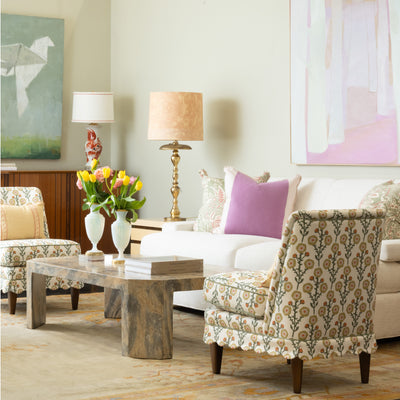 Image of Blue Print showroom with side chairs, coffee tables, colorful artwork, and other decorative elements.
