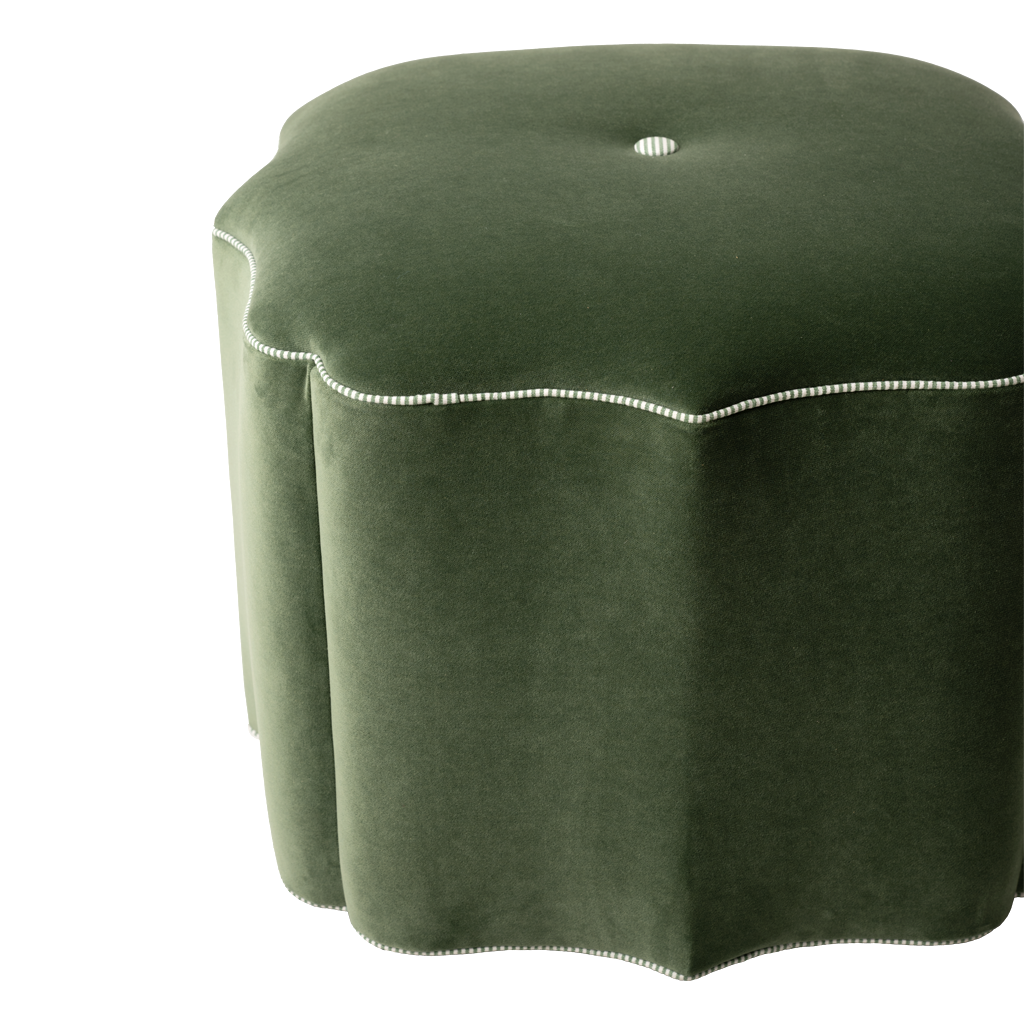 Green upholstered ottoman with green and white trim
