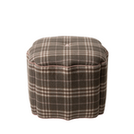 Plaid patterned ottoman on a white background