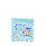 A square light blue napkin with scalloped edges, featuring a colorful embroidered beach scene with umbrellas, people, and towels on a white background.