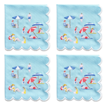 Four square light blue napkins with scalloped edges, each printed with a beach scene featuring people, umbrellas, chairs, and towels in small multicolor embroidery.