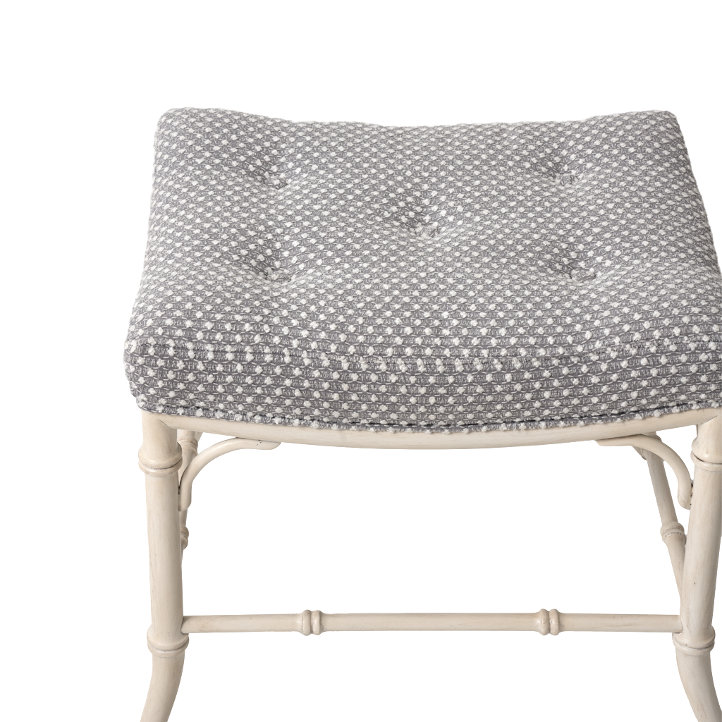 Square white bench with gray and white fabric cushion