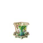 Hexagonal Canton Famille Rose porcelain jardiniere with colorful floral and figure motifs, sitting on matching stand.