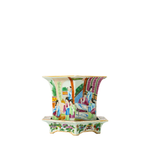 Porcelain Canton Famille Rose jardiniere with detailed hand-painted figures and floral patterns on hexagonal stand.