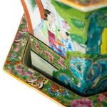 Hexagonal Canton Famille Rose porcelain jardiniere with colorful floral and butterfly motifs on stand.