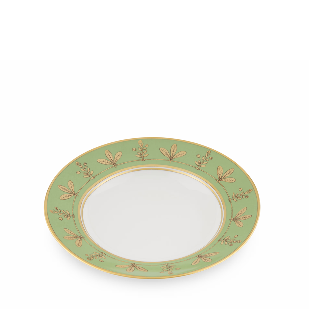 Decorative plate with green rim and floral patterns on a white background