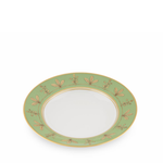 Decorative plate with green rim and floral patterns on a white background
