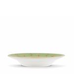 White bowl with green rim and floral patterns on a white background
